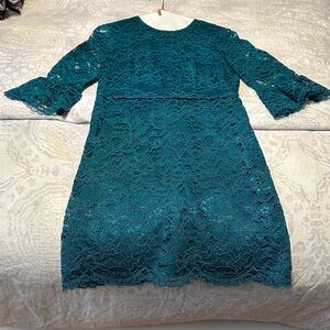 Woman’s Teal Lace Dress with Bell Sleeves